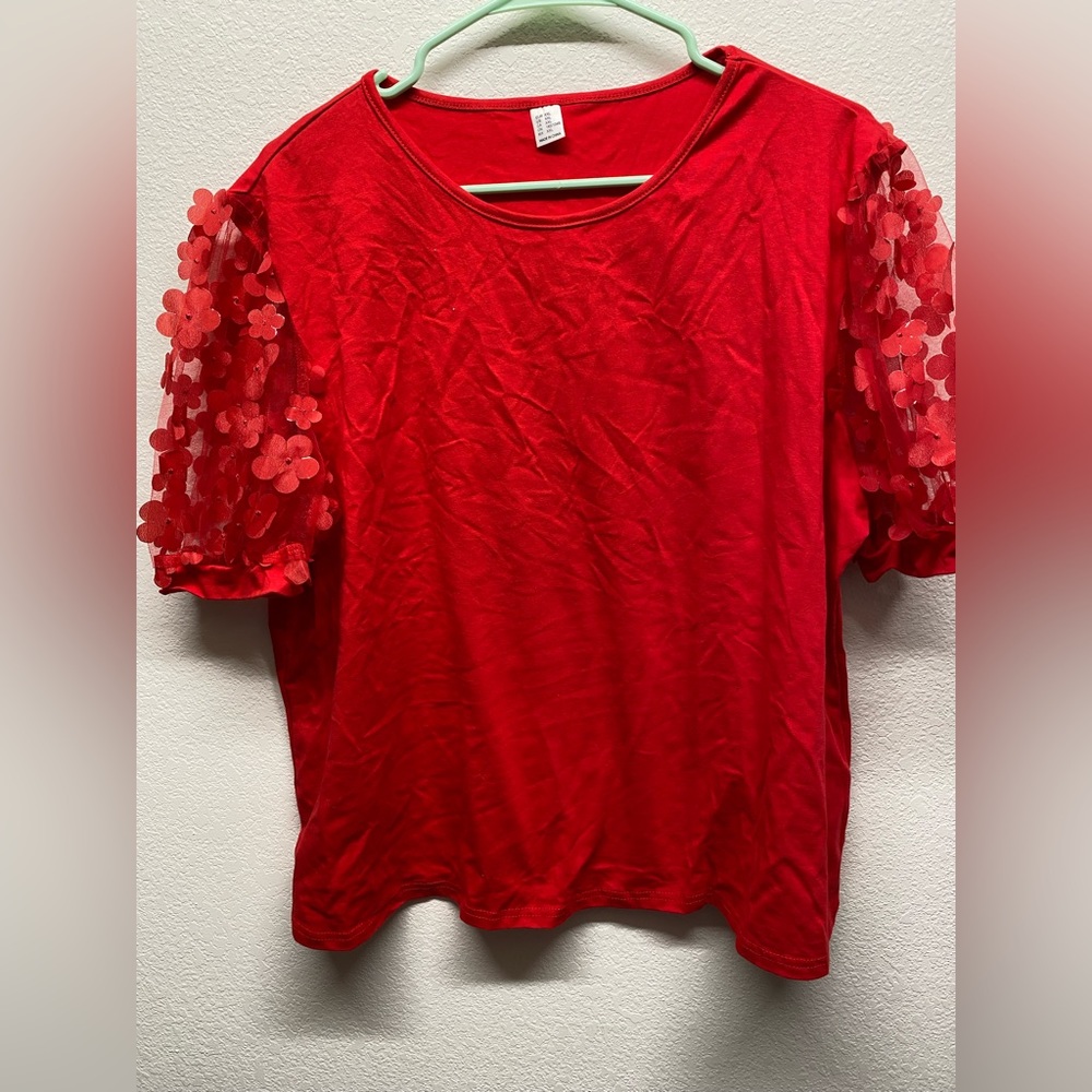 Red short sleeved shirt with flowers on sleeve, size XXL